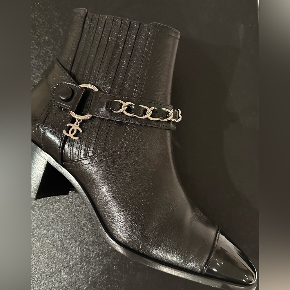 Chanel short black boots with silver chain detail